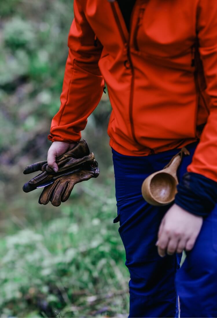 mobile slideshow image man hiking outdoors wearing red jacket